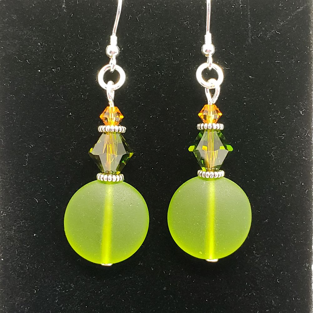 Earrings on a black background
