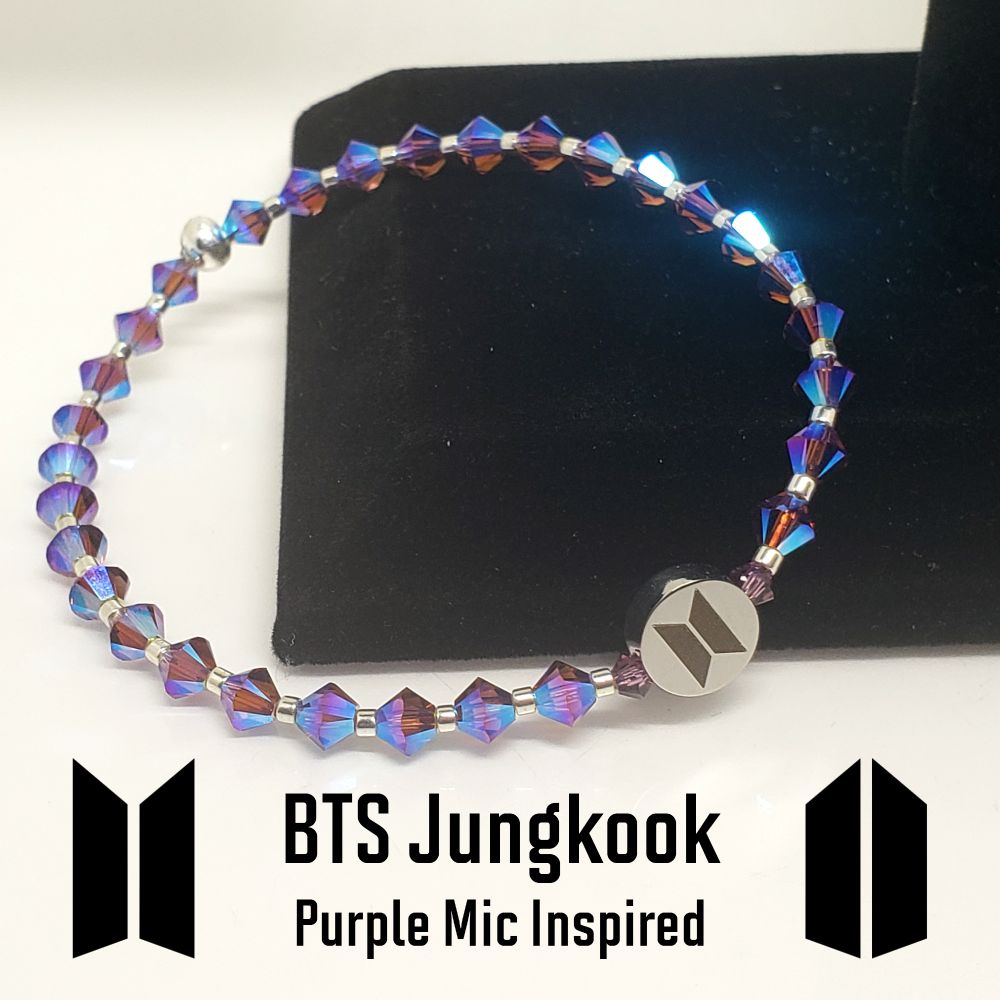 Size 6.25" bracelet inspired by BTS Jungkook's Purple Microphone. Includes 4mm Crystal beads in Amethyst AB 2X (Aurora Borealis effect), 2 each 3mm Amethyst beads, custom stainless steel bead with BTS logo on one side and ARMY logo on the other side and galvanized silver seed beads. The crimp bead is Sterling Silver. I am an ARMY and all my bracelets are handmade by me.