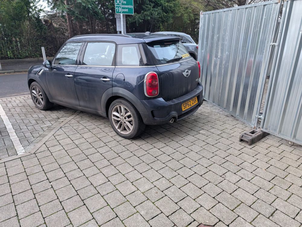 The mini with registration SP62ZXR parked very badly once again. 