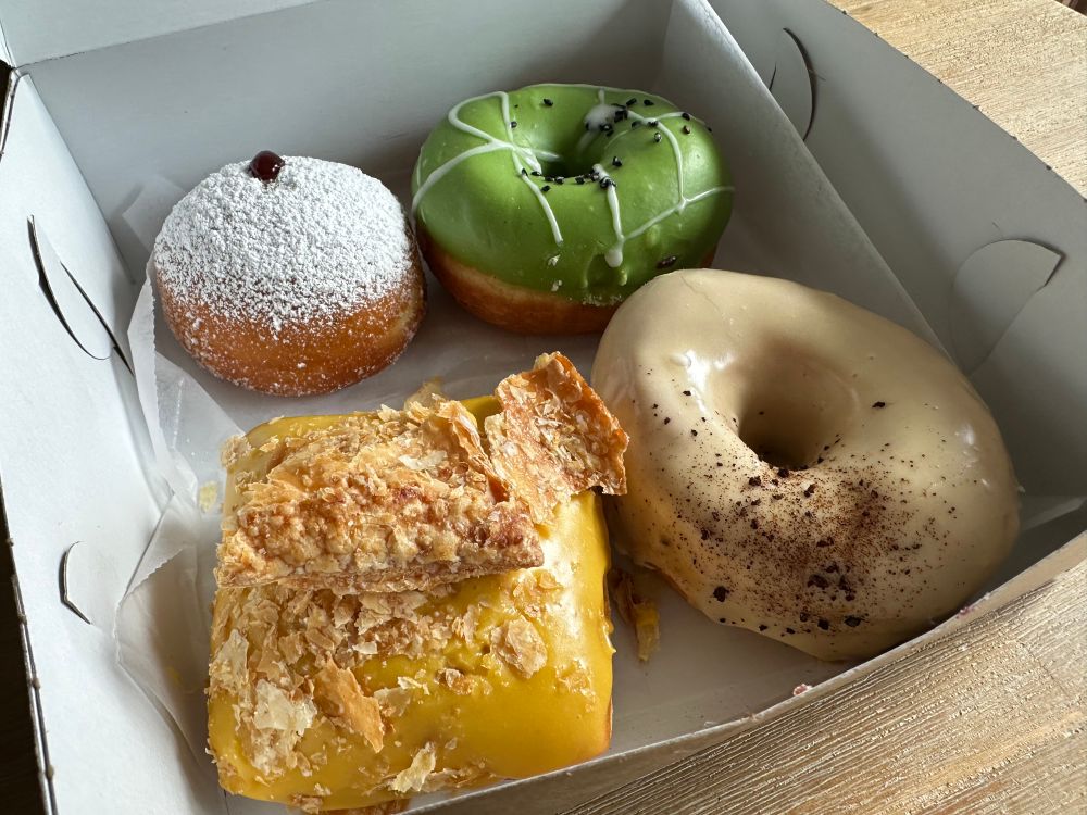 A box full of beautiful doughnuts