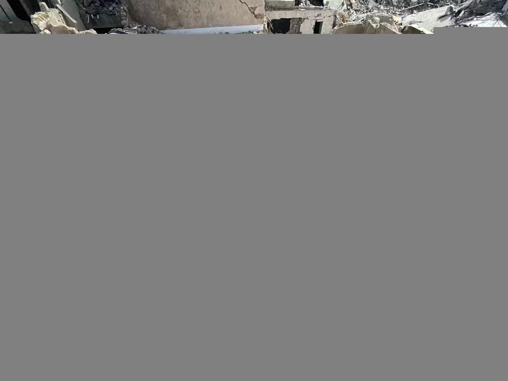 Damage across the central courtyard of Hathat Palace. CCHP