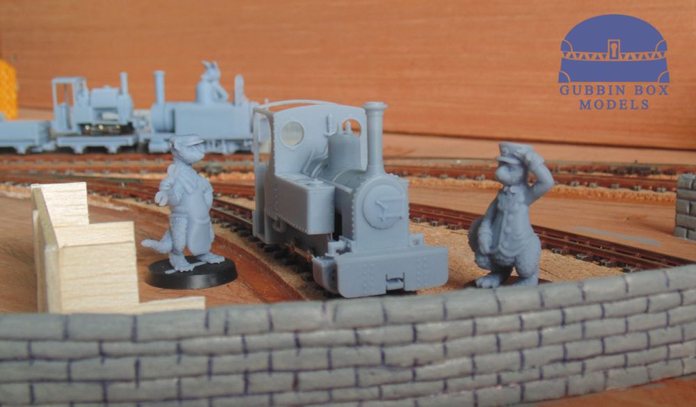 Randell and Milkdrop looking over "Spirit", a new locomotive kit soon to be released posing on the working in progress Gadwall Estate model railway.