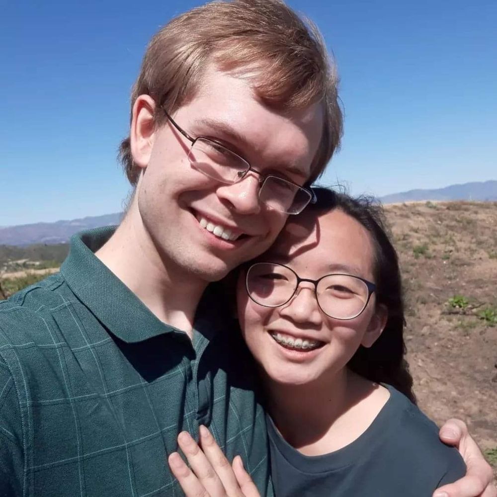 Am and woman in an embrace.