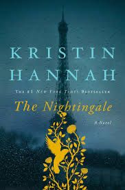 Book cover of 'The Nightingale' by Kristin Hannah, featuring a silhouette of the Eiffel Tower in the background with a blue and gold color scheme, and an illustration of a bird and floral design in gold at the bottom.