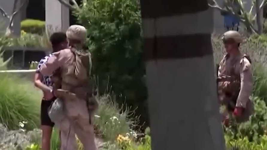 Marines temporarily detain man while guarding LA federal building; cities prep for 'No King' rallies