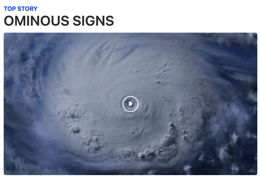 In the upper left, small text in blue that reads TOP STORY. Just below that, in larger black text, OMINOUS SIGNS. Below both lines of text is an image of a hurricane with a play button in the middle, indicating it is a video. The combination is suggestive of vague featured content on a news website (which is appropriate, as that is what it is).