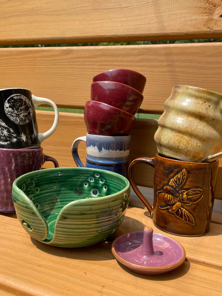 An assortment of ceramics in different shapes and colors