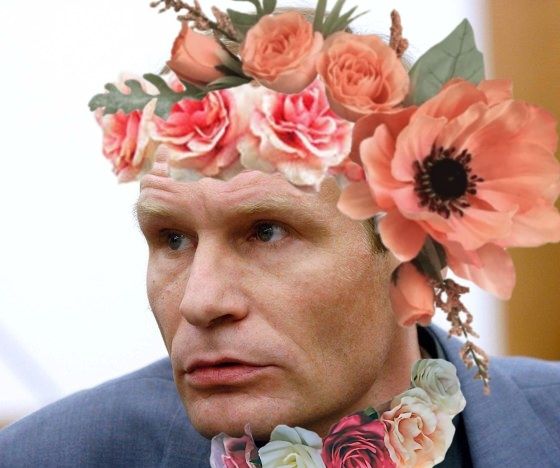 Armin Meiwes, a famous German cannibal, with poorly photoshopped flower crowns 