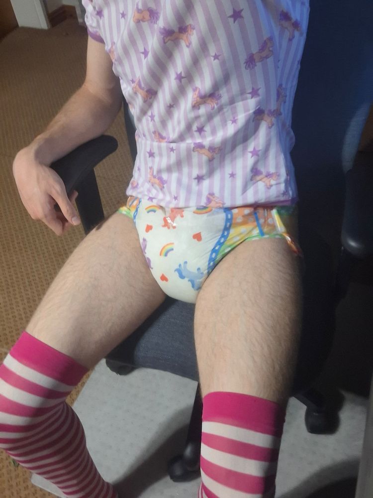 Same pose as before, just showing off more of the legs with their striped pink and white socks on