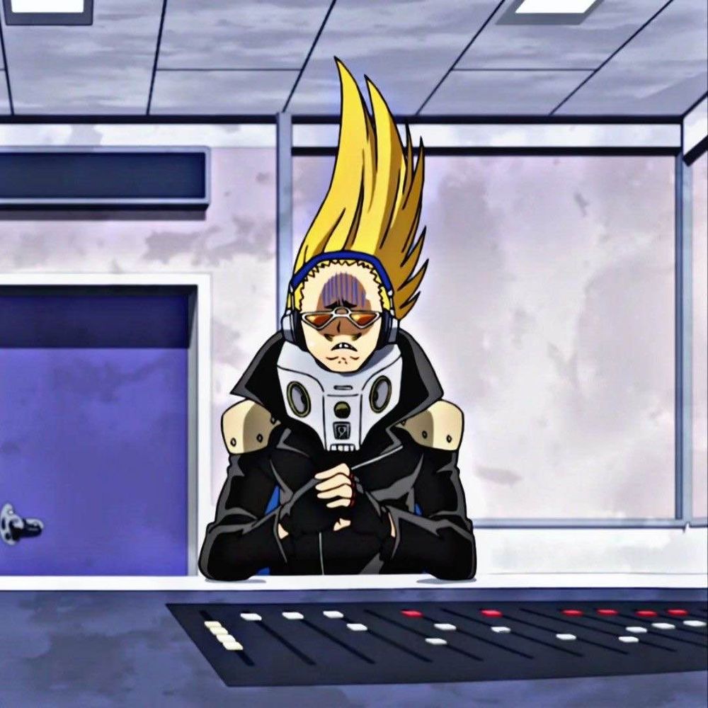 The reference photo of the first picture. Present Mic is in the same position as described in the first photo, but this is a screenshot from the anime (specifically the second season) and he is sat down at a table. 