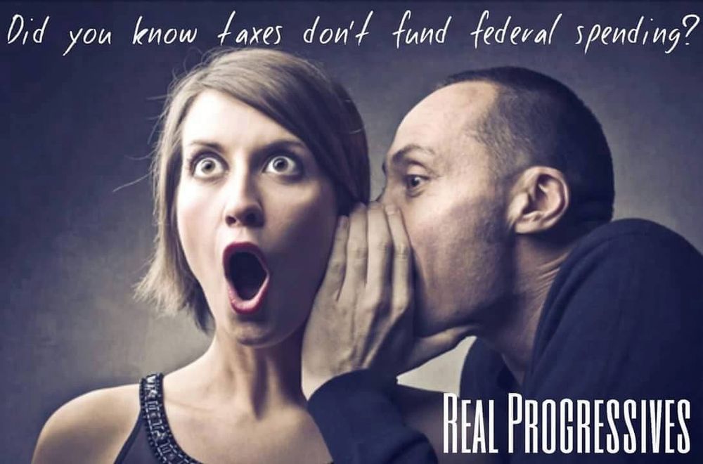 A man whispering in the ear of a woman with a shocked expression “Did you know taxes don’t fund federal spending?”