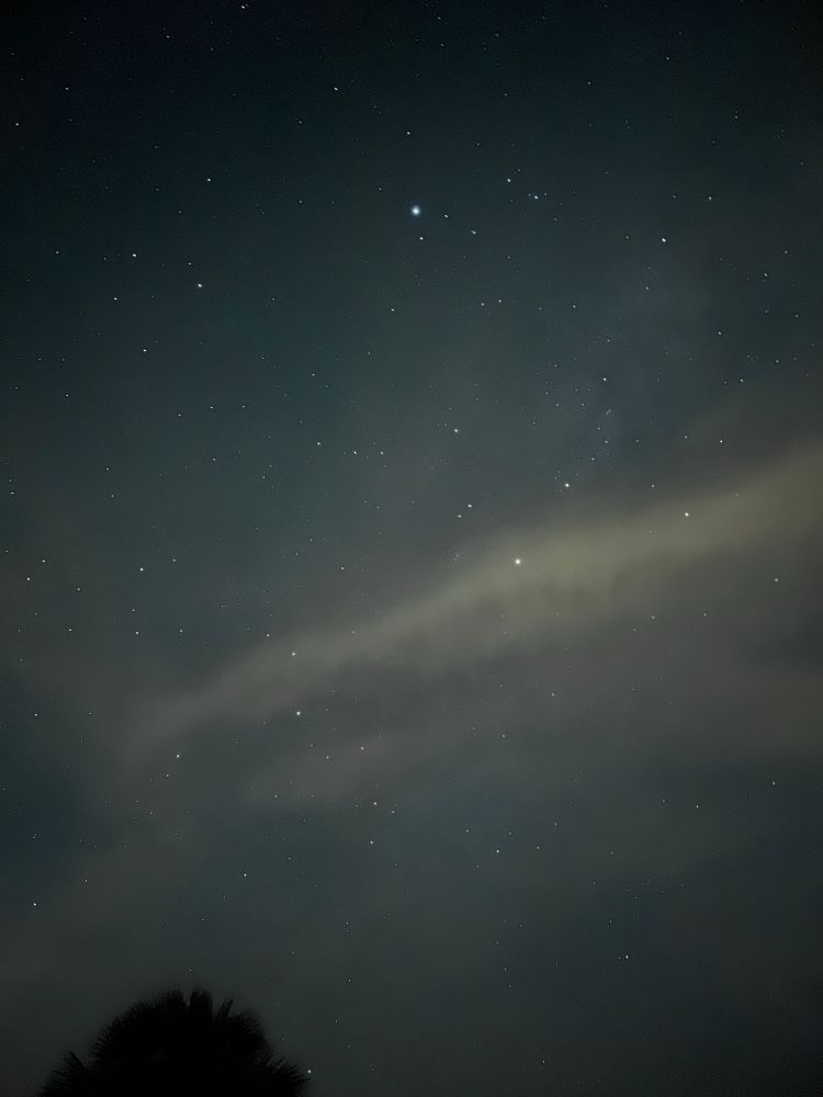 A long exposure photo of the night sky.