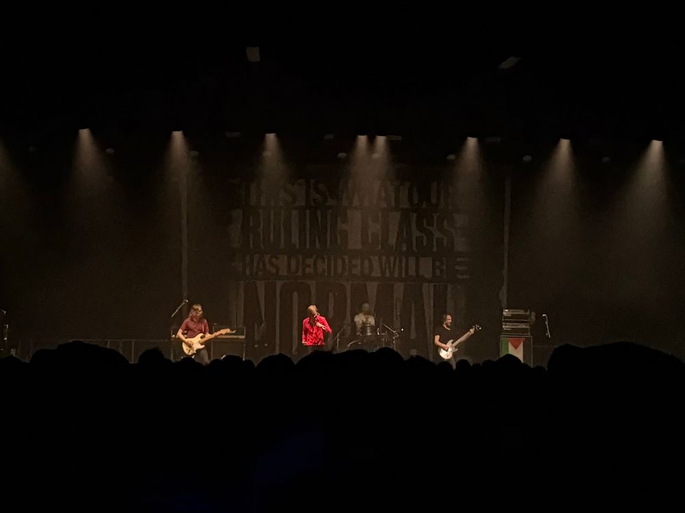 Refused playing, lit by muted down lighters. Still had my hearing at this point.