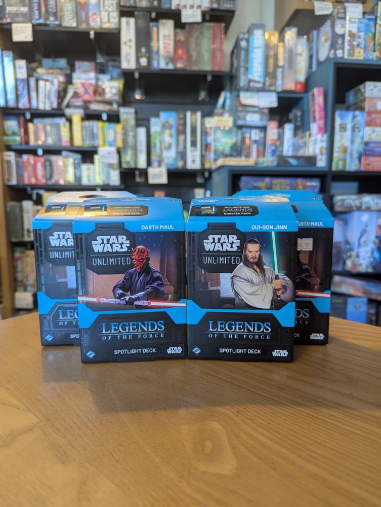 Star Wars Unlimited Legends of the Force decks on a table in the Edinburgh board game shop Ancient Robot Games.