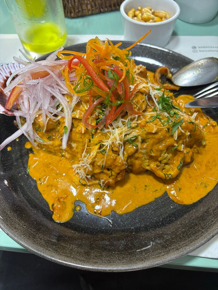 Photo of a “Seafood Tacu-Tacu”, a peruvian dish. 