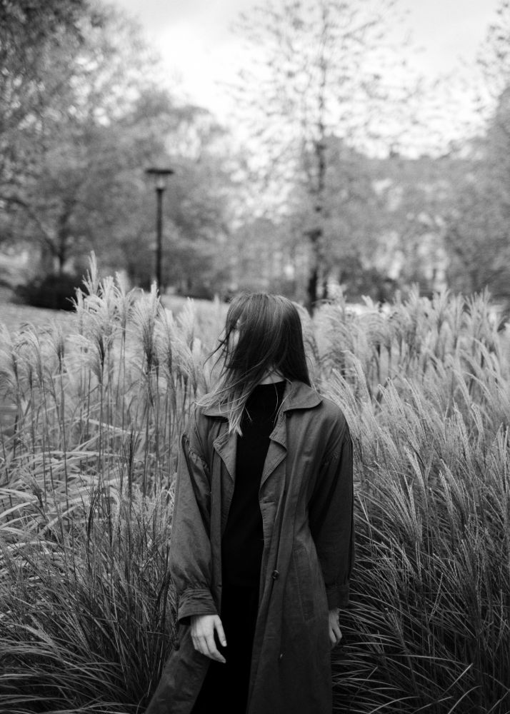 Black and white portrait of a young woman in Stockholm.
