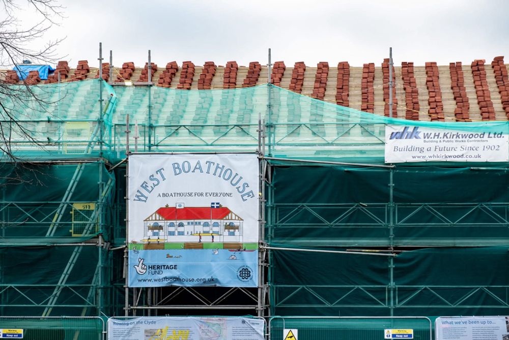External view of the West Boathouse clad in scaffolding.