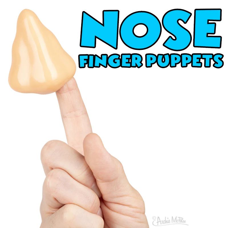 A person's hand is shown holding a novelty finger puppet shaped like a nose. The text above reads "NOSE FINGER PUPPETS." 