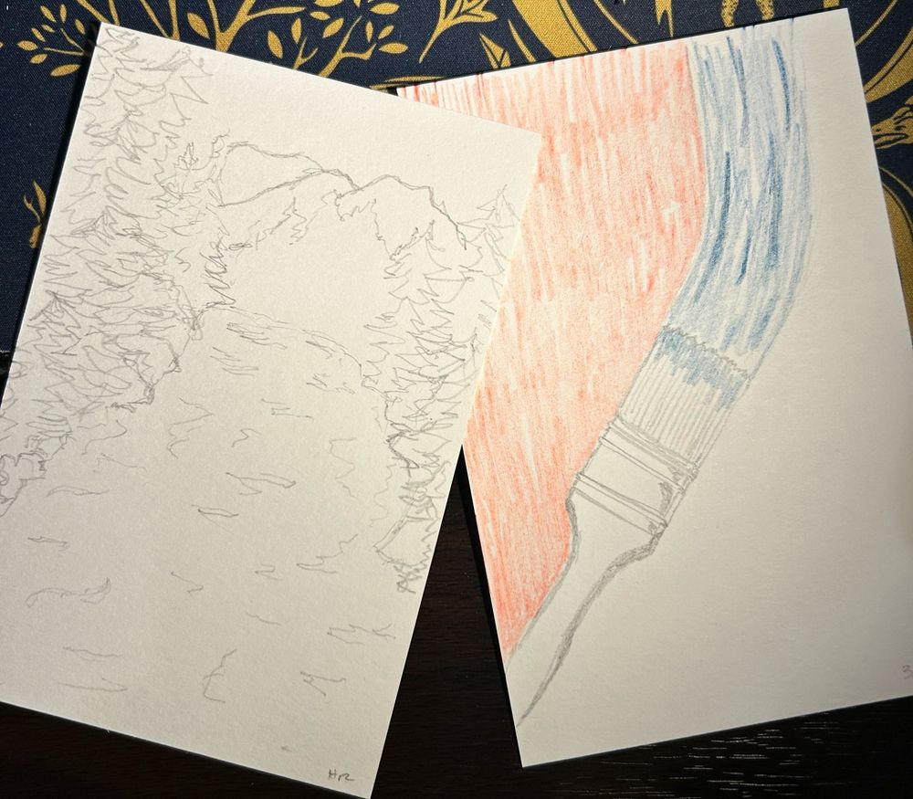 Two pencil sketches on white paper. The one on the left depicts a loose sketch of a river, with evergreen trees and rocks on its banks and hills in the distance. The one on the right depicts a paintbrush. The brush is rendered in pencil, and there is a curved blue section representing blue paint. Only the tips of the paintbrush are blue. The paintbrush and paint are arranged diagonally across the paper. On the left side of the paintbrush and paint is colored in red. 