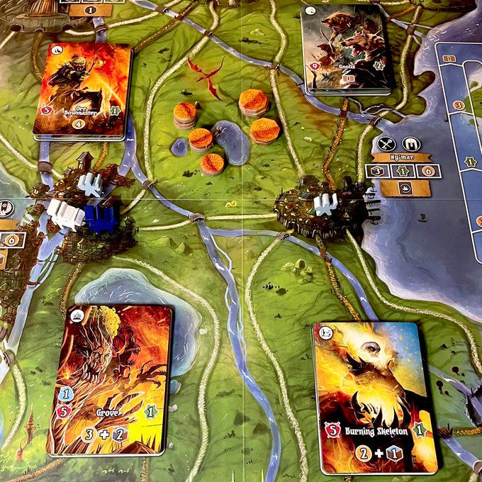 The board of the game Margraves of Valeria. It shows a map of the area, each of which connects to some monster cards
