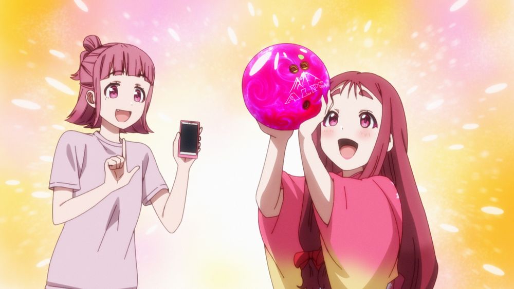 a modern teenager showing a sengoku-era girl a bowling ball