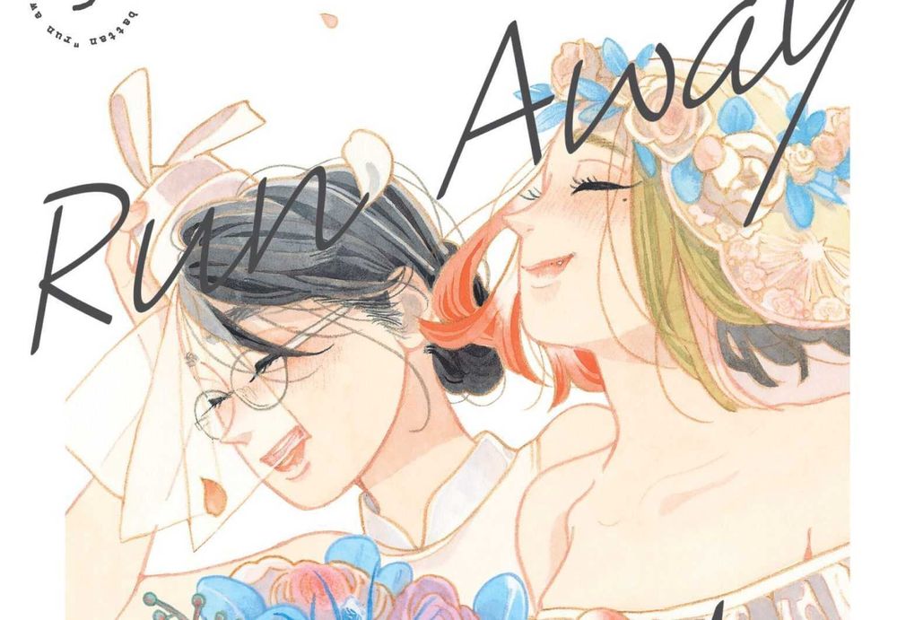 two smiling women in wedding dresses