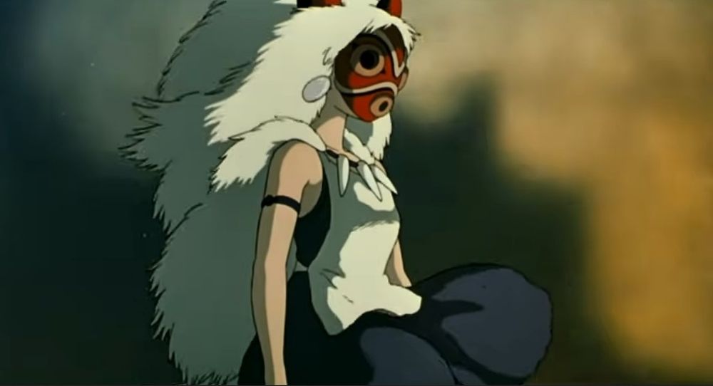 San wearing her wolf mane and mask