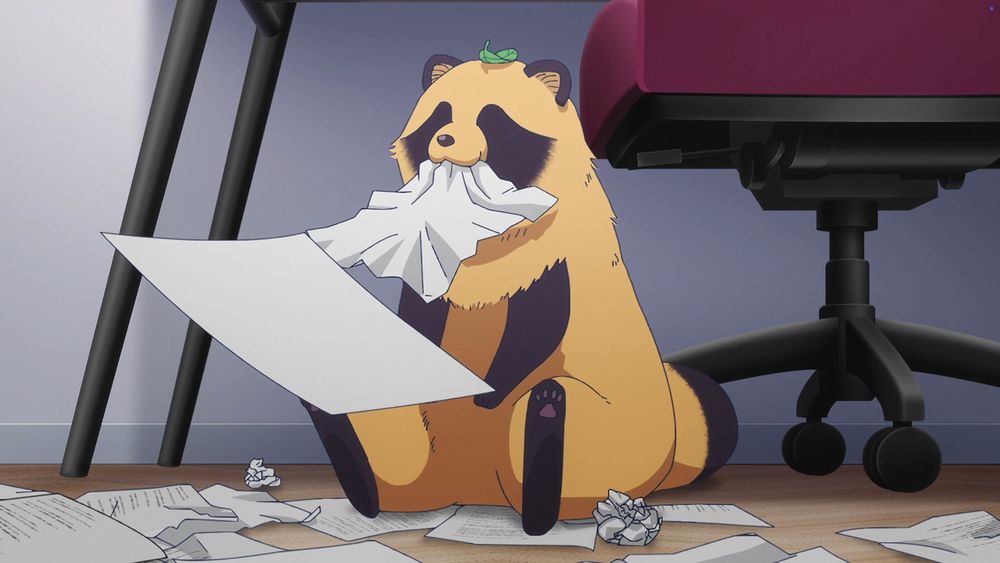 a tanuki holding a sheet of paper and chewing on another