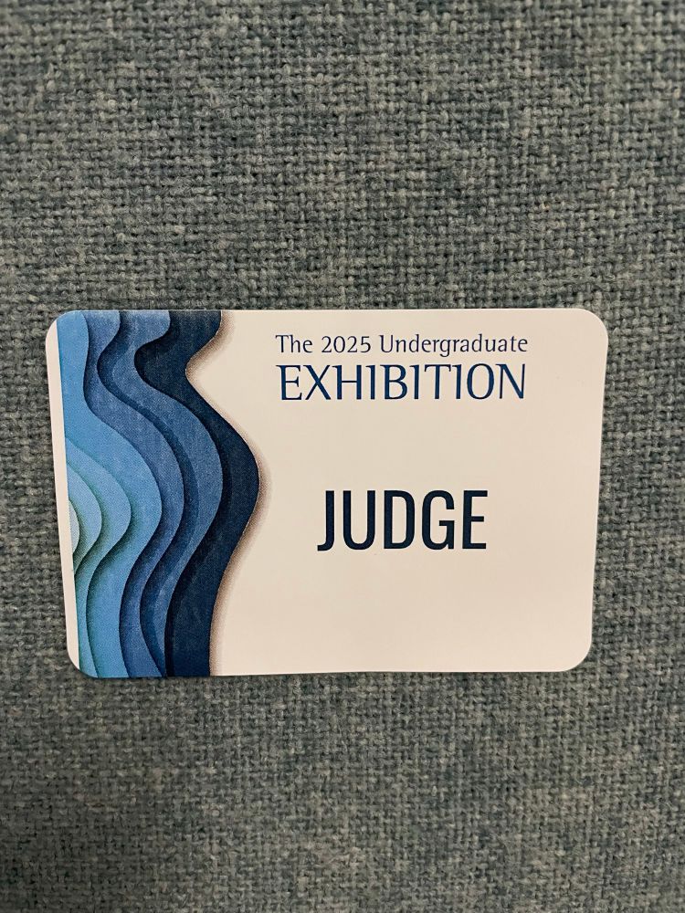Name tag with the words “The 2025 Undergraduate Exhibition JUDGE”