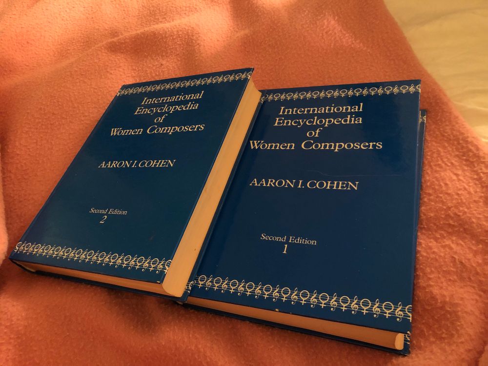 A photo of the two volume work discussed. Bright blue cover, resting on my bed. Poor light. 