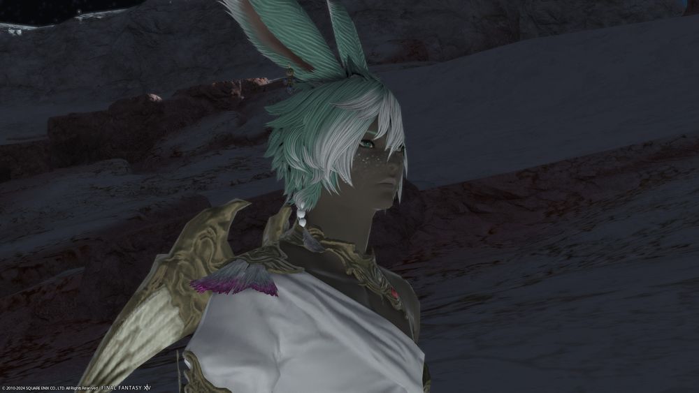 Viera (rabbit) man with pastel green hair and white highlights, wearing angel themed clothing.