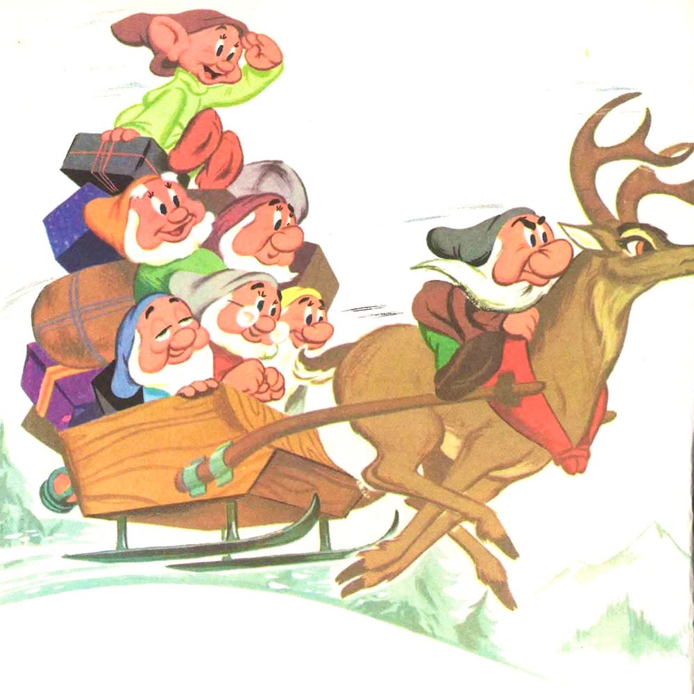 The seven dwarfs are in a sleigh with presents dragged by a deer ridden by Grumpy. The background is a mountain landscape covered in snow.