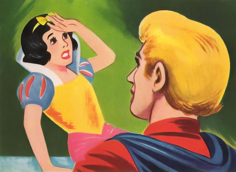 Snow White wakes up, puts her left hand on her forehead. In the foreground, a blond Prince looks at her.