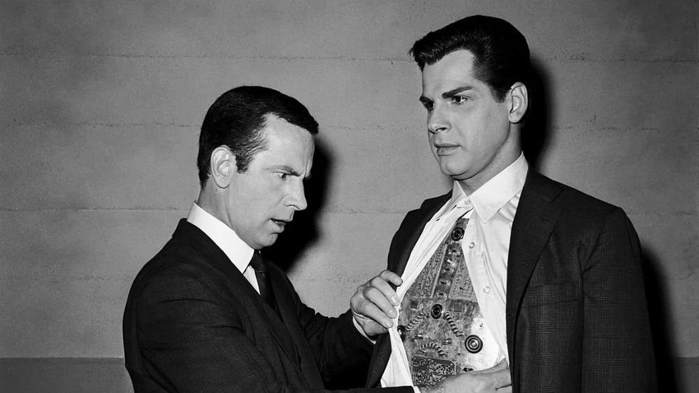 Maxwell Smart and his robot assistant Hymie