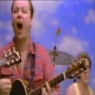 Black Francis pretending to sing for a music video by just leaving his mouth open