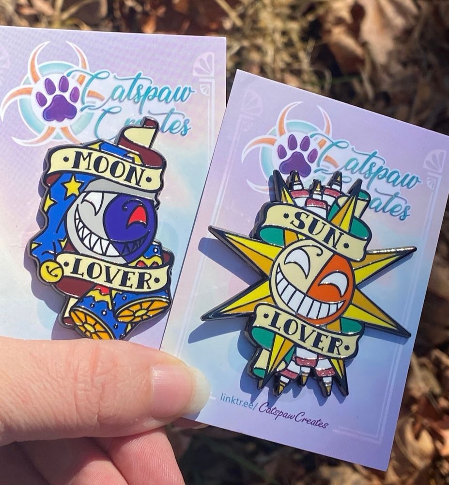 Photo of Sun and Moon enamel pins