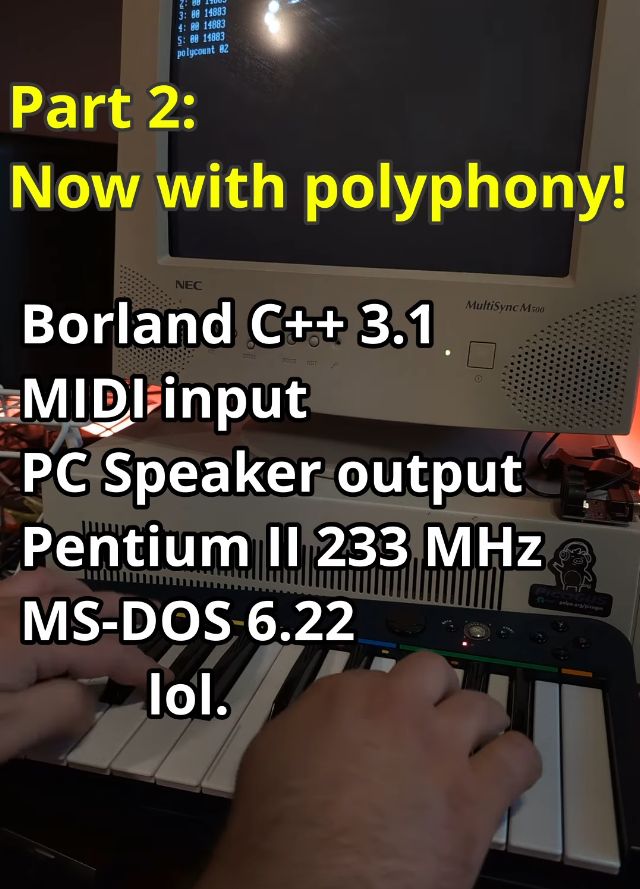 a beige CRT is showing Borland C++ 3.1 running in msdos with its classic blue and gray user interface. Some C code is showing on screen.