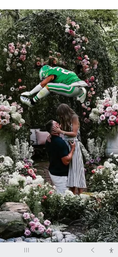 Taylor Swift, Travis Kelce getting engaged...and Saquon Barkley over head LOL!