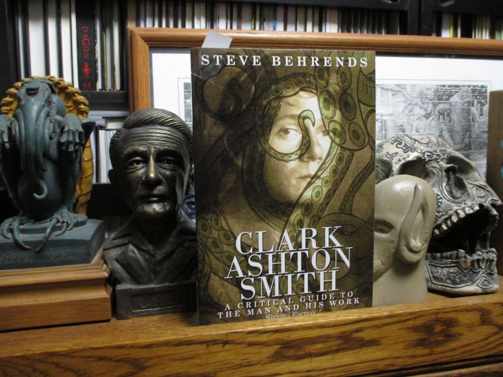 Book catalogue project, day 358: Clark Ashton Smith: A Critical Guide to the Man and His Work (2nd Ed.) (2013, Wildside Press). Paperback. Clean pages, minimal wear.

On the cover: a photograph of a young Clark Ashton Smith, overlaid with tentacles.
