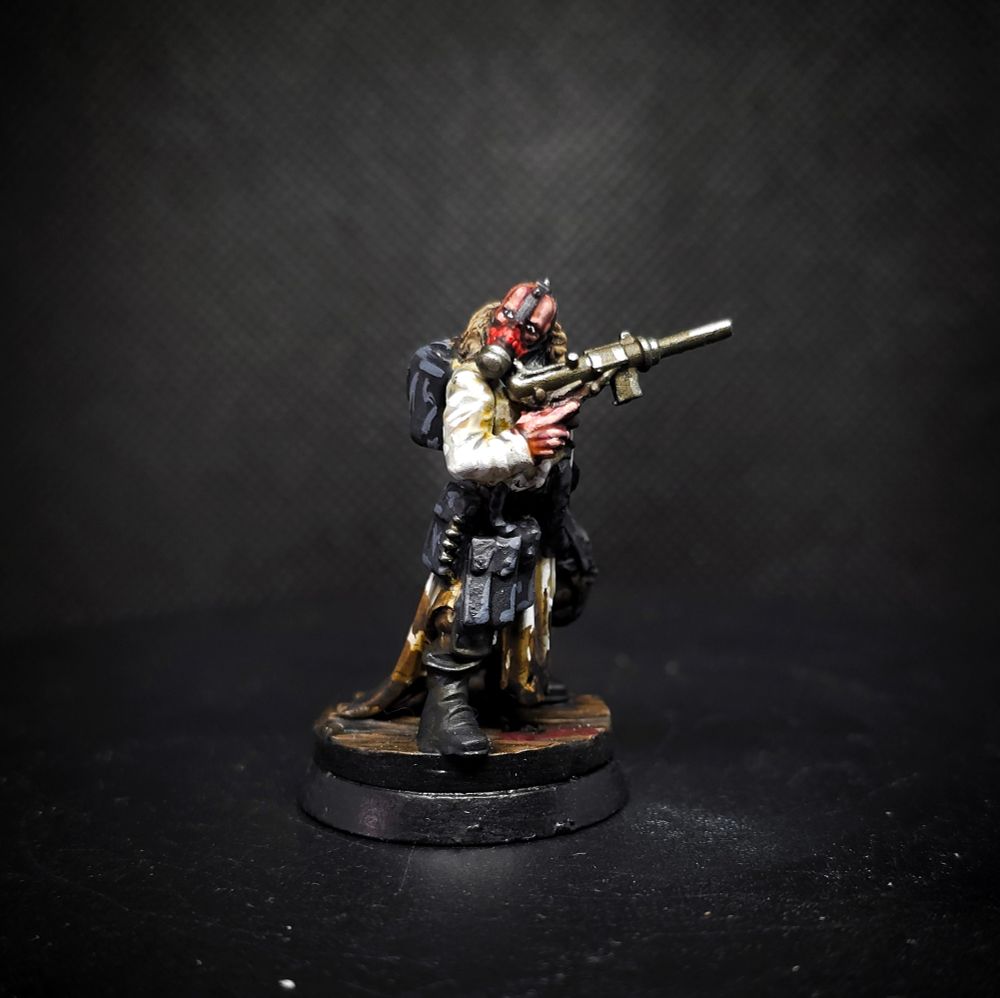 The trooper with sub-machine gun, looking over his shoulder while he reloads