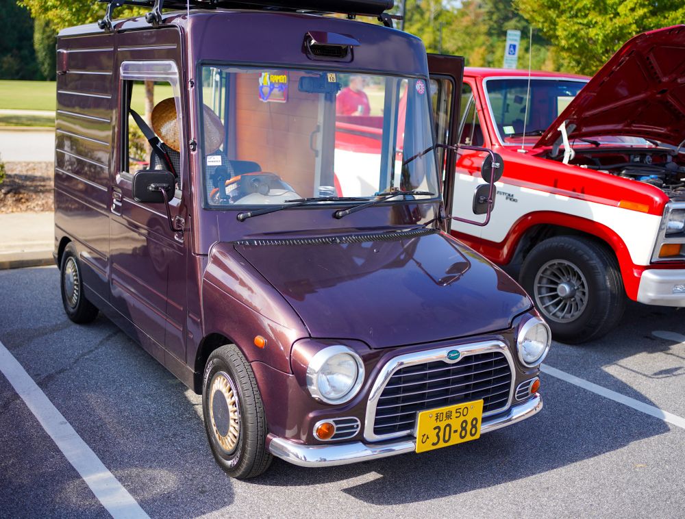 Color photograph of a Daihatsu Mira from last week’s car show. 