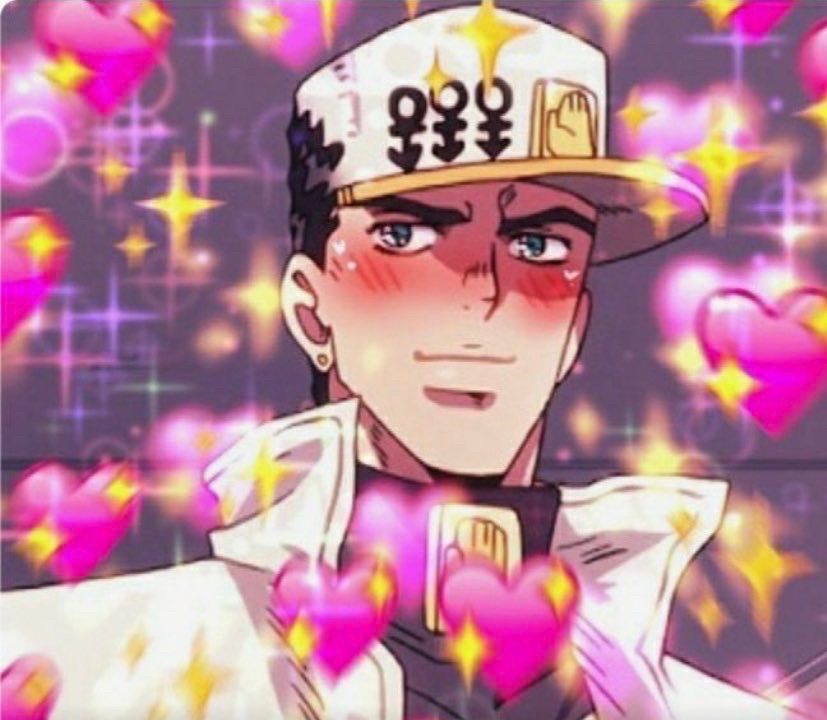 A pic of Jotaro Kujo from Jojo’s bizarre adventure part 4 diamond is Unbreakable. He’s a tanned black haired guy, with teal eyes. He’s smiling. He wears a white coat, a black shirt and a white cap with anchors drawn on it and a little gold hand pin on it. He’s surrounded by pink hearts and little stars.