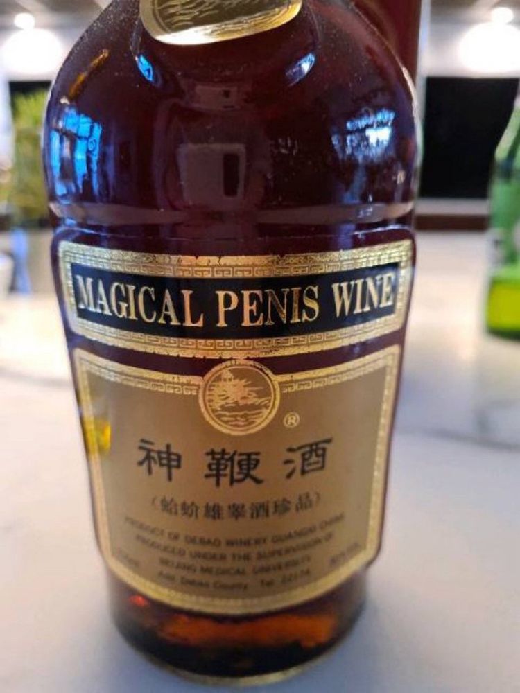 bottle saying "magical penis wine"