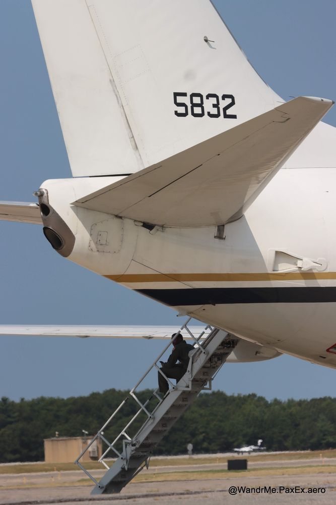 Soldier sitting on the rear steps of a 737/C-40.