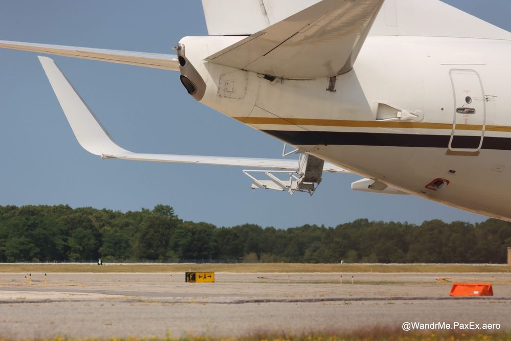 Rear stairs of the C-40 folding up into the plane.