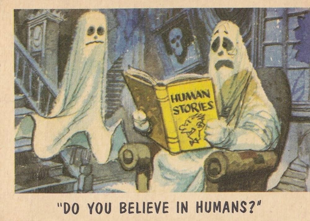 The drawing shows two classic bedsheet-ghosts in their ghost home full of cobwebs, broken windows and grandfather clocks. One of them is floating down the stairs, as the other one is sitting in an armchair, reading a book of 'Human Stories'. They both seem rather scared, when the one reading is asking the other one: "Do you believe in humans?"