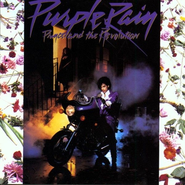 Prince and The Revolution Purple Rain; Prince sitting on motorcycle 