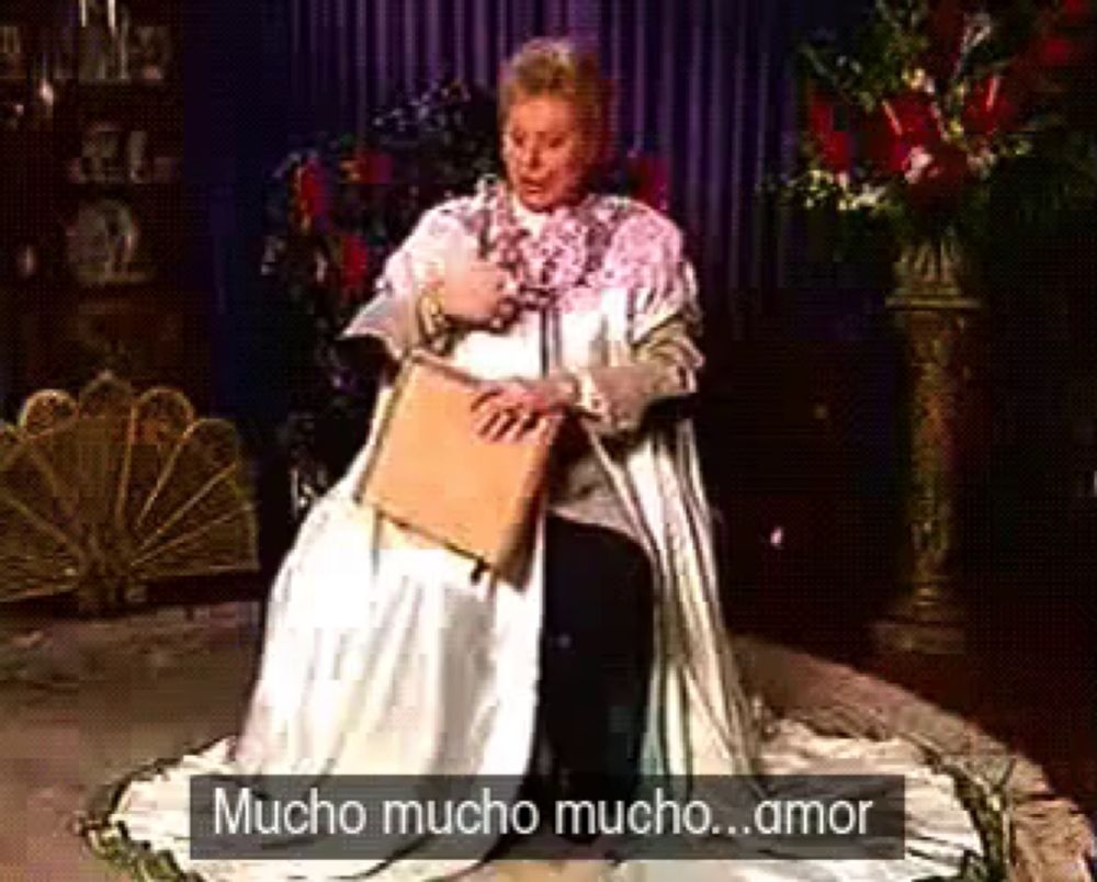 a woman in a white dress is kneeling down with the words mucho mucho mucho amor on the bottom