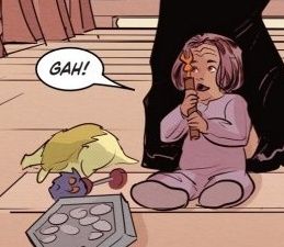 comic panel sat on the floor holding one of b'elannas tools up saying GAH!