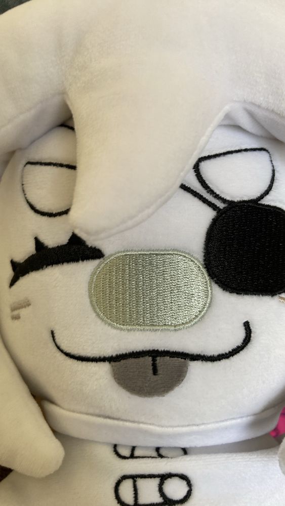 a closeup of the makeship siffrin 2.0 plush's face